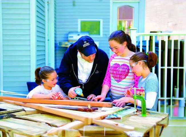 Kids building with their dad